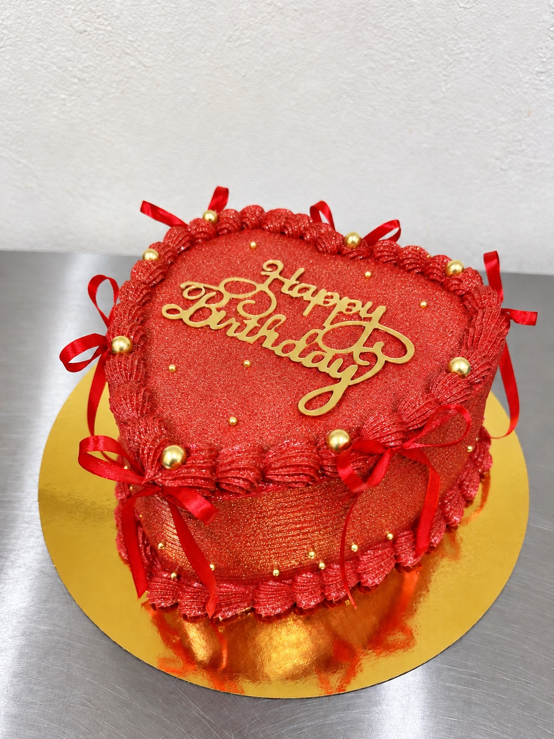 Red heart-shaped custom cake